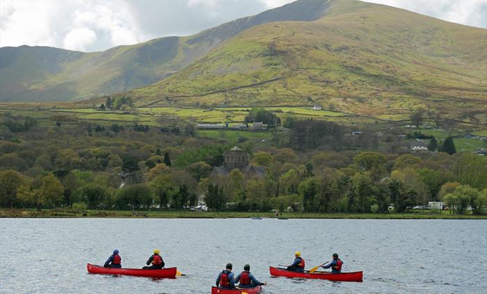 Canoring on Llyn Padarn Lake, Llanberis. Beautiful scenery from the valley of Yr Wyddfa Snowdon